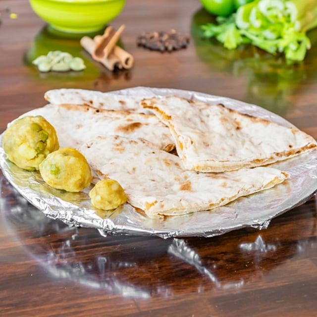 Aloo Paratha with Butter.